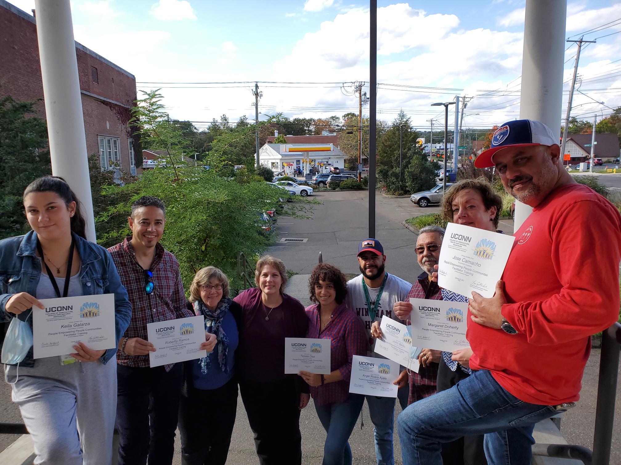 Faye Griffiths-Smith and Trish Spofford with a group of PEP Communities facilitator graduates in 2022.